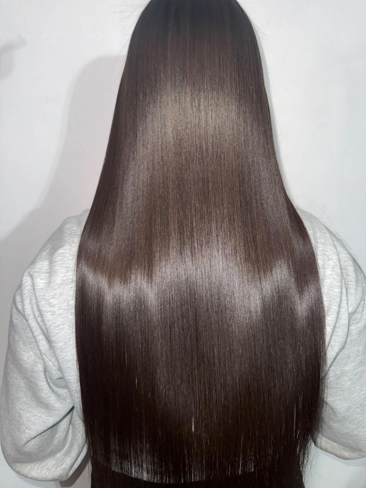 Brazilian Keratin Treatment — Bellavue Beauty Salon, JVC Dubai Brazilian Keratin result at Bellavue Beauty Salon JVC Dubai — long, sleek, glossy hair